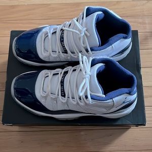 Jordan 11. Size 6.5. Blue patent and white